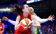 Indiana Fever guard Caitlin Clark looks to shoot as Dallas Wings guard Odyssey Sims defends at College Park Center. Photo Credit:Imagn